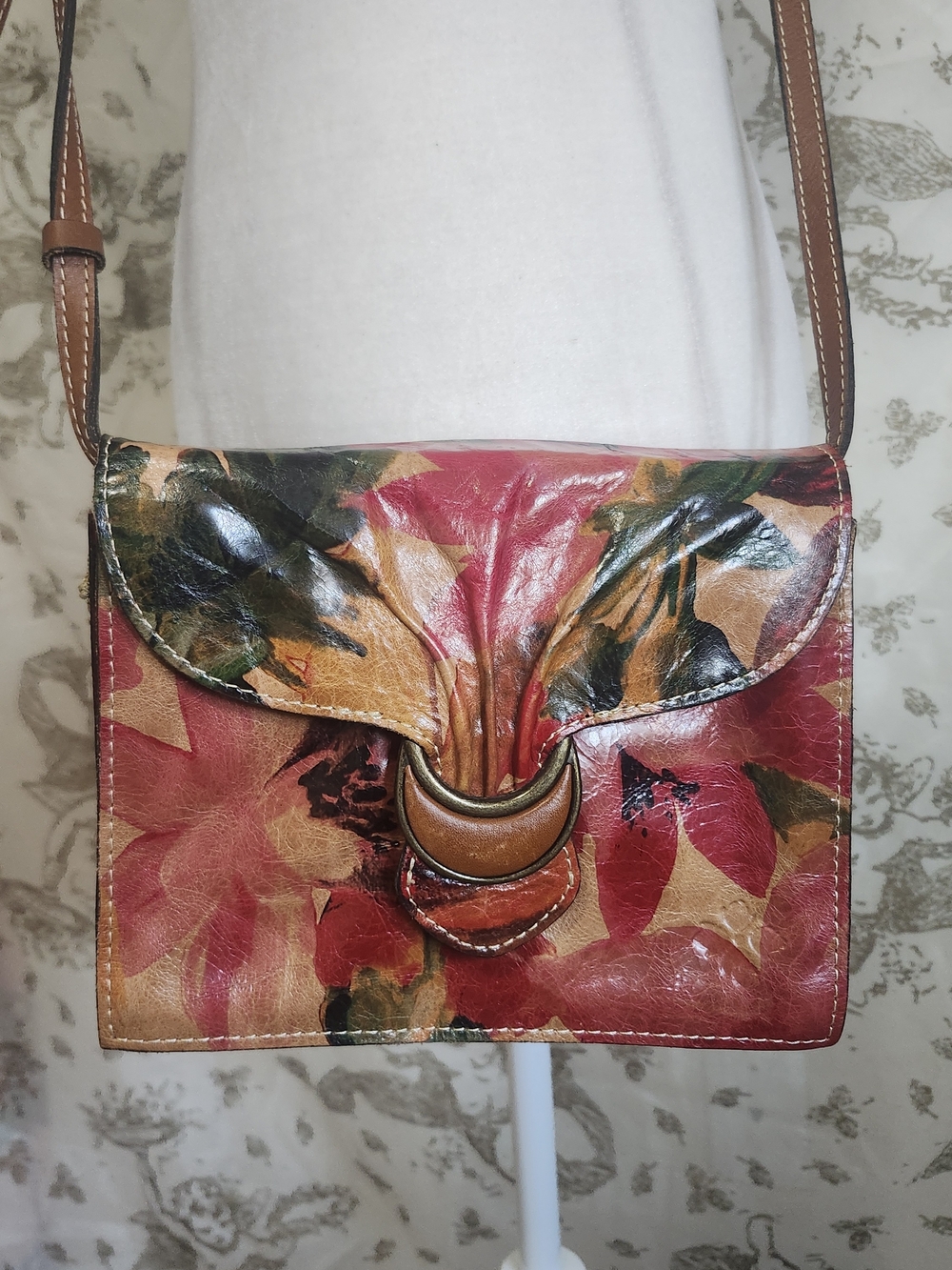**Patricia Nash** tropical convertible crossbody/clutch, now available!